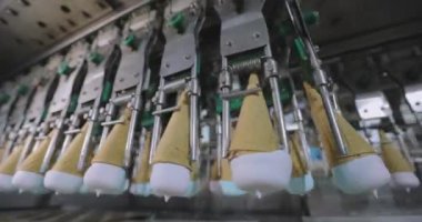 How ice cream is made. The process of making ice cream. Automated ice cream factory.