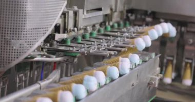 Freezing ice cream at the factory. Automatic production of ice cream. Ice cream production at the factory.