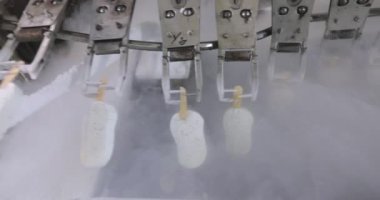 Freezing ice cream at the factory. Automatic production of ice cream. Ice cream production at the factory.