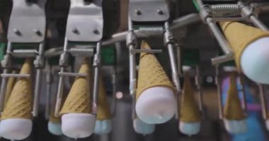 How ice cream is made. The process of making ice cream. Automated ice cream factory.