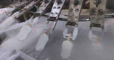 Freezing ice cream at the factory. Automatic production of ice cream. Ice cream production at the factory.