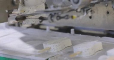 Automated conveyor line. Automated production of ice cream. Modern ice cream factory.
