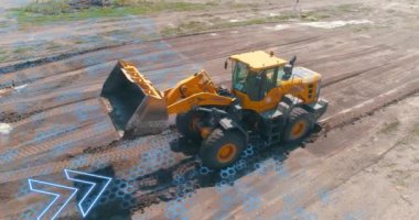 The grader works at the construction site. The concept of a smart grader. A smart construction site. Visualization of smart construction.