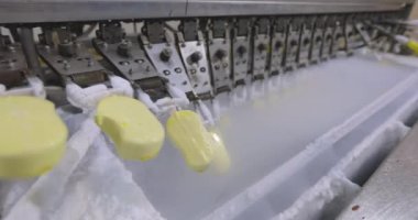 Freezing ice cream at the factory. Automatic production of ice cream. Ice cream production at the factory.