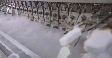 Freezing ice cream at the factory. Automatic production of ice cream. Ice cream production at the factory.
