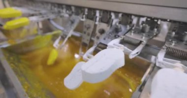 Freezing ice cream at the factory. Automatic production of ice cream. Ice cream production at the factory.