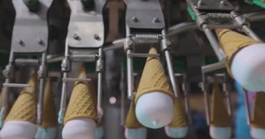 How ice cream is made. The process of making ice cream. Automated ice cream factory.