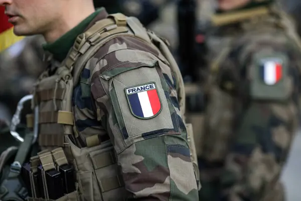 stock image Bucharest, Romania - December 1, 2023: Shallow depth of field image with details of a French soldier in uniform during the Romanian National Day military parade.