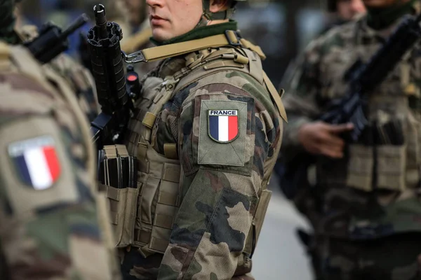 stock image Bucharest, Romania - December 1, 2023: Shallow depth of field image with details of a French soldier in uniform during the Romanian National Day military parade.