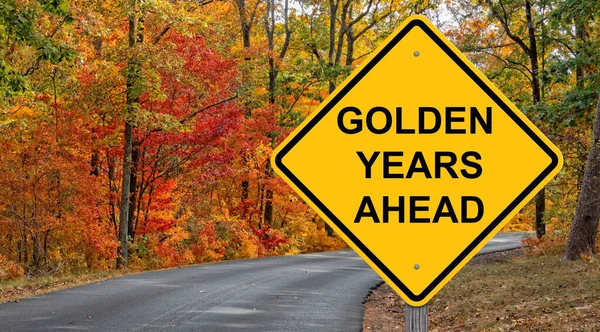 Golden Years Ahead Caution Sign Autumn Background — Stok Foto