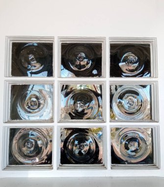 Detail of an old window made of crown glass