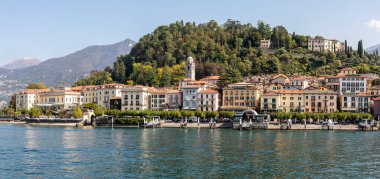 panoramic view from the lake of the lakefront at bellagio on lake como sunny day