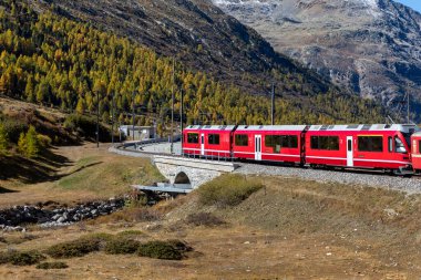 bernina express mountain railway train at bernina diavolezza