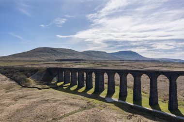 ribblehead viaduct and ingleborough in the yorkshire dales from the east summer day no people clipart