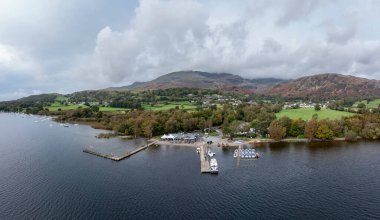 coniston water lake district the old man of coniston and the boating centre aerial view clipart