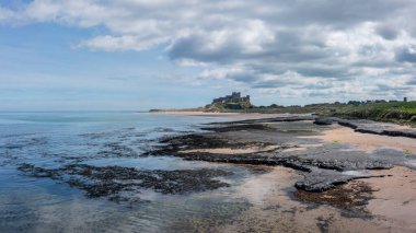 Bamburgh Castle from Harkness Rocks to the north with no people elevated view