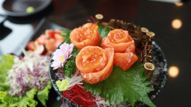Salmon Sushi Japanese food. on the table in restaurant. Japanese cuisine Sashimi Salmon sushi nigiri
