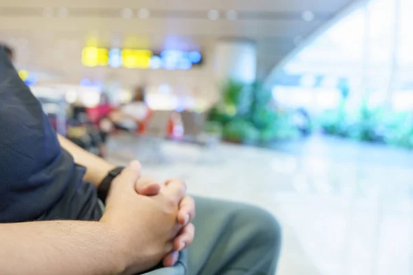 stock image Man waiting for flight in airport departure area at airport waiting the flight.