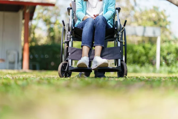 stock image Young asian woman in wheelchair with positive thinking