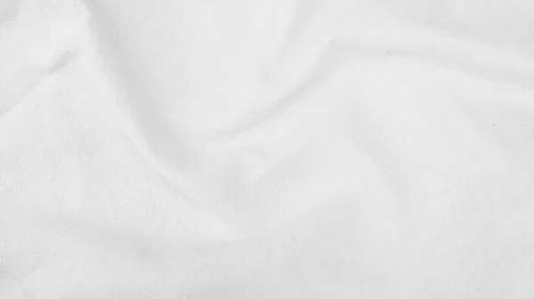 オーガニックファブリックコットンの背景ホワイトリネンキャンバスクランプナチュラルコットン生地ナチュラルハンドメイドリネントップビューの背景オーガニックエコテキスタイルホワイトファブリックリネンコットンテクスチャ — ストック写真