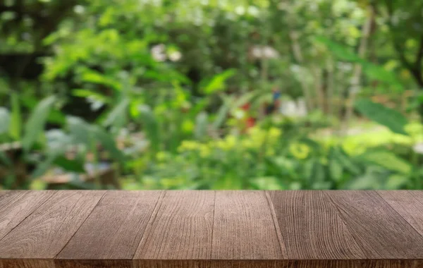 stock image Empty wood table top and blur of out door garden background Empty wooden table space for text marketing promotion. blank wood table copy space background