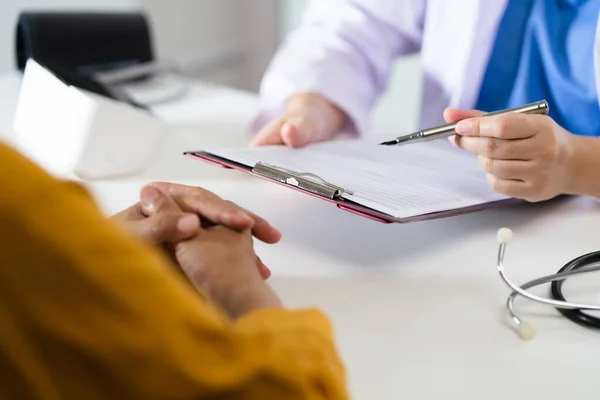 stock image Healthcare. Doctor and patient are discussing interview consulting patient. Professional medical doctor in the hospital. Healthcare and medical 