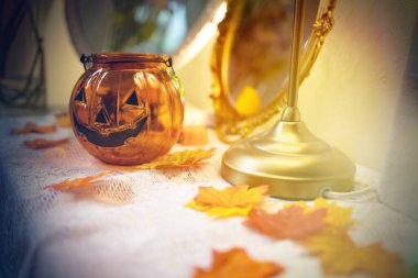 Halloween decorations background. Halloween Scary pumpkin head on wooden table Halloween holiday concept