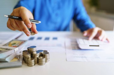 Small business accounting Businesswoman Accountant verify growing business with calculator. Accountancy Concept
