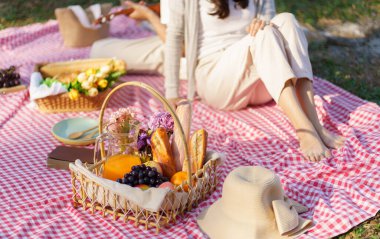 Picnic Lunch Meal Outdoors Park with food picnic basket. enjoying picnic time in park nature outdoors