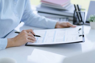 Small business accounting Businesswoman Accountant verify growing business with calculator. Accountancy Concept