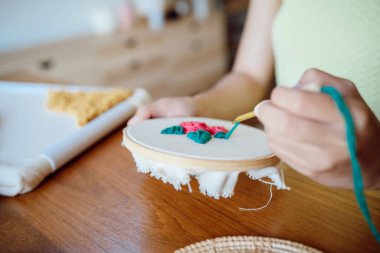 Punch needle. Asian Woman making handmade Hobby knitting in studio workshop. designer workplace Handmade craft project DIY embroidery concept