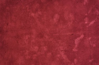 Lekeli eski betonun yüzeyi. 2023 'ün rengi, kırmızı renk ve kopyalamak için boşluk. Yüksek kalite fotoğraf