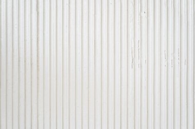 Tasarımın için bir kopya alanı olan beyaz dalgalı bir duvar. Duvarda dekoratif alçı var. Net olmayan duvar yüzeyi. Yüksek kalite fotoğraf