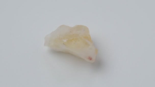 Natural Stone Untreated Citrine Crystal Yellow Quartz Selective Focus White — Stock video