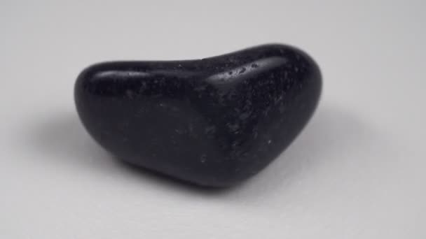 Natural Mineral Rock Specimen Polished Black Onyx Gemstone White Background — Vídeos de Stock