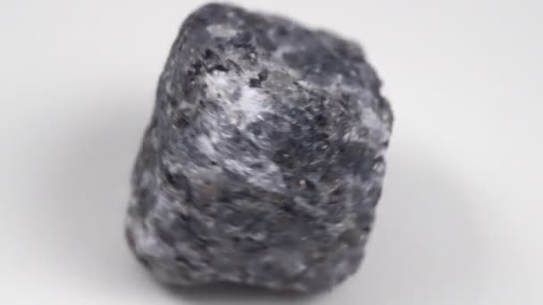 Crystal Cordierite Iolite Gem Stone Cutout Raw Mineral White Background — стоковое видео