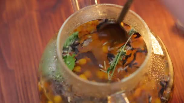 Concept Medicinal Herbal Tea Glass Teapot Selective Focus Sea Buckthorn — Stok video