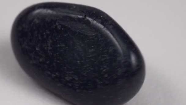Close Natural Mineral Geological Collection Tumbled Black Onyx Gem Stone — Stockvideo