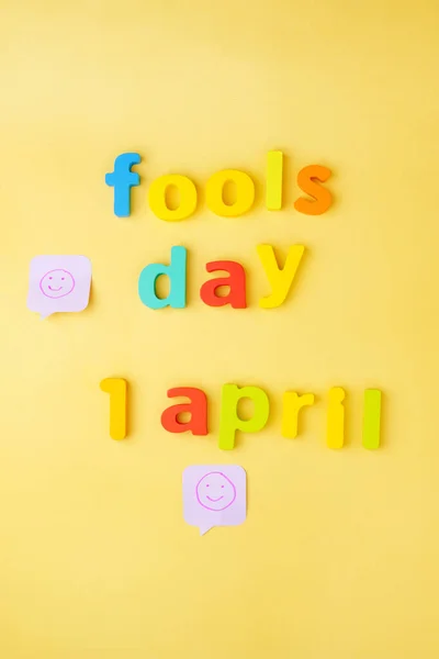 Yellow Background Laughing Cartoon Faces Smile Fools Day April Vertical — Stock Photo, Image
