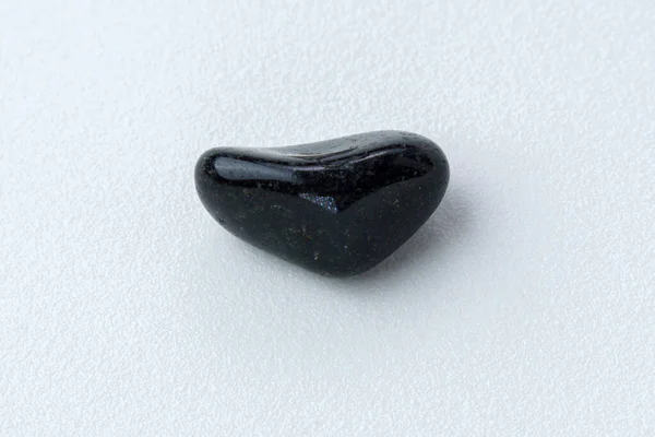 Close Natural Mineral Geological Collection Tumbled Black Onyx Gem Stone — Fotografia de Stock