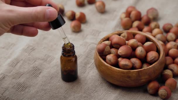 ヘーゼルナッツ 化粧品のナッツの使用のための油 栄養価の高い要素 — ストック動画
