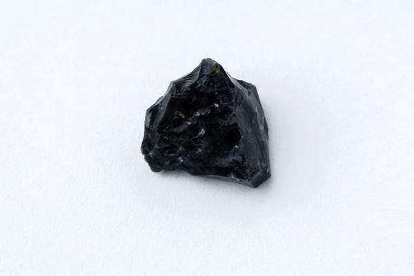 Black Obsidian Stone White Background Natural Glass Black Mineral Gem — Stockfoto