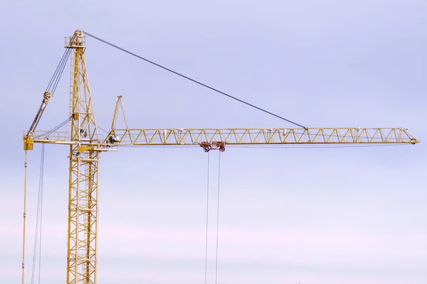 Tower construction crane construction crane. Close up. Copy space. Concept of construction, industry, business