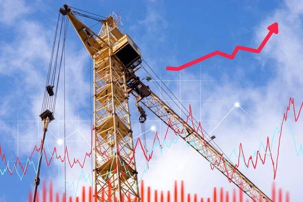 Successful investment on property development business and construction industrial with tower crane , chart and graph.