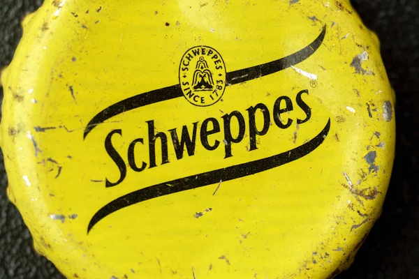 stock image Tyumen, Russia-February 15, 2023: Old schweppes lid. Schweppes is a brand of soft drinks founded by Jacob Schweppe in 1783