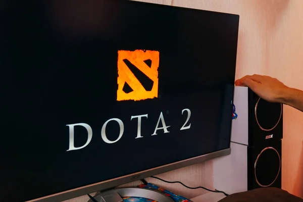 stock image Tyumen, Russia-March 29, 2023: Man plays Dota 2 on a computer. Selective focus