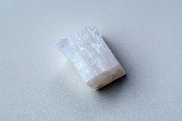 stock image Selenite stone. Healing selenite chunk, morphological variation of natural gypsum