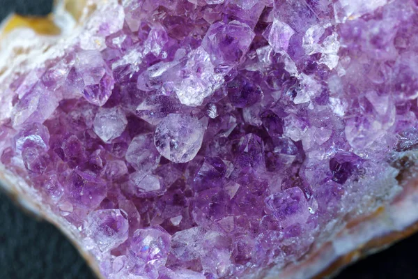 stock image Crystal stone is a mineral. Purple rough amethyst quartz crystals, close up macro