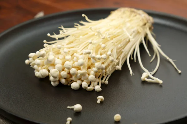 stock image Popular in asian cuisine fresh needle mushroom or enoki, enokitake Flammulina velutipes.