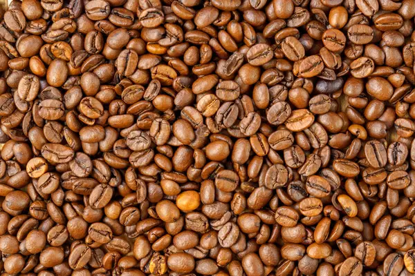Roasted coffee beansl, coffee industry. Scene of coffee beans. Texture